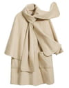 Le manteau-cape en laine Le manteau-cape en laine